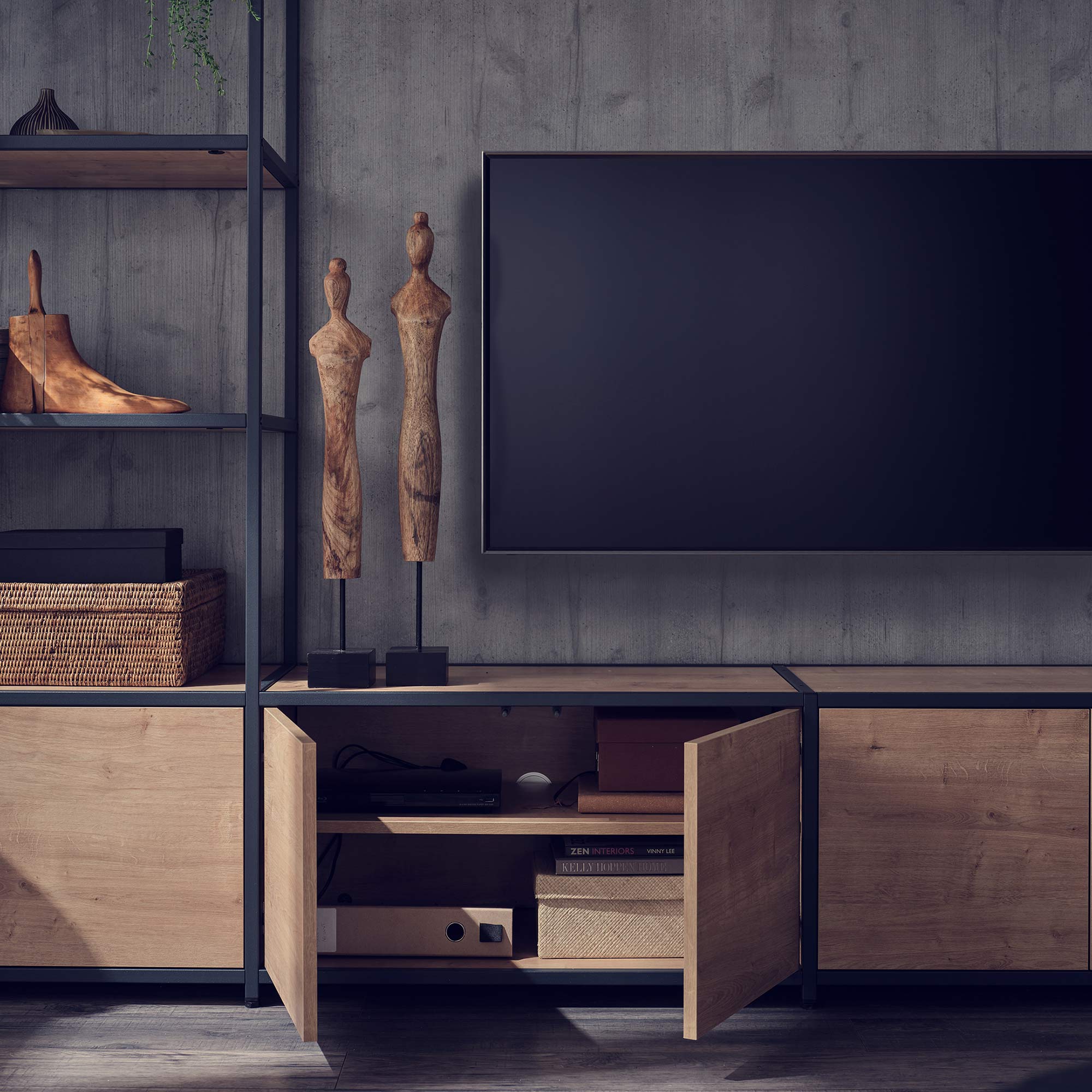 TV surrounded by wooden shelving and cupboards