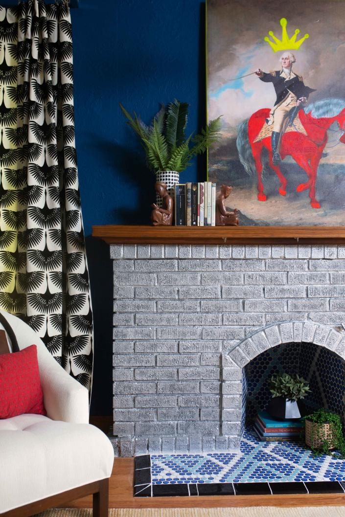 Designer Susannah Watts gives a basic brick fireplace an extra spark with metallic paint.