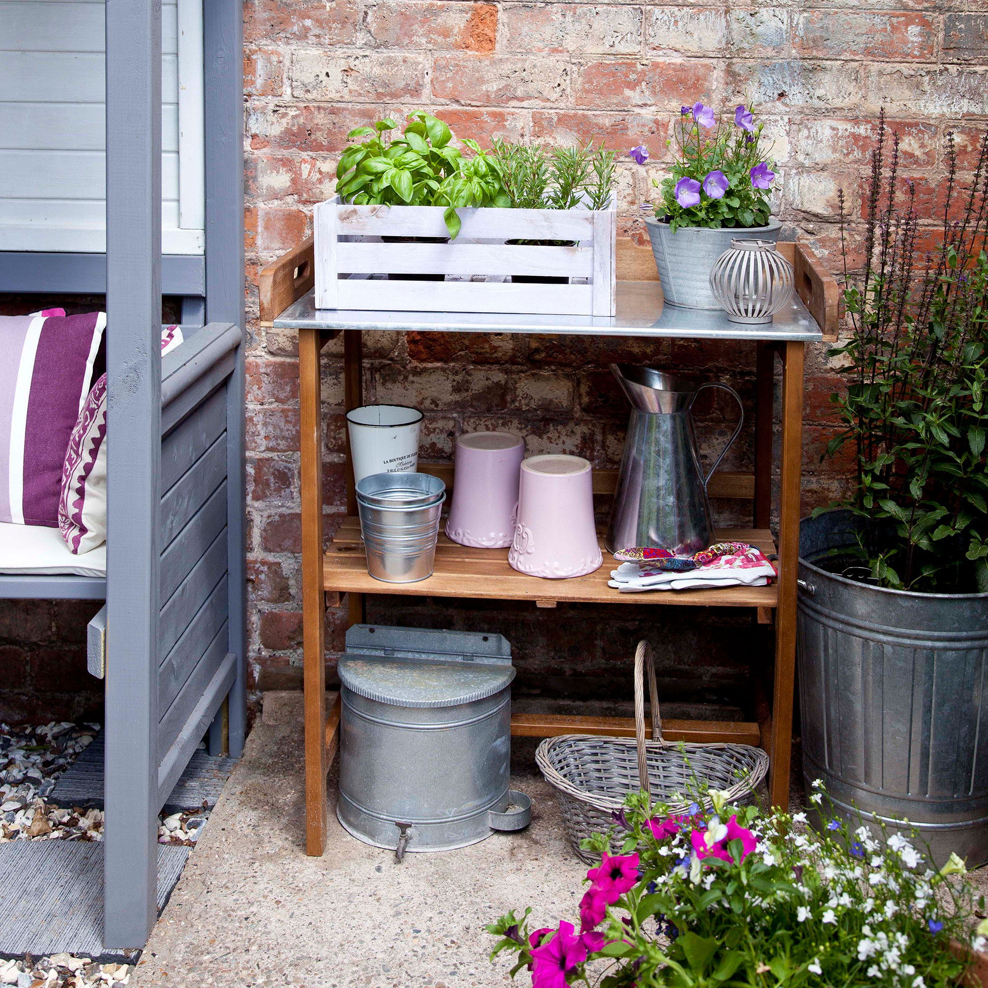 Concrete patio with potting shelving and pot