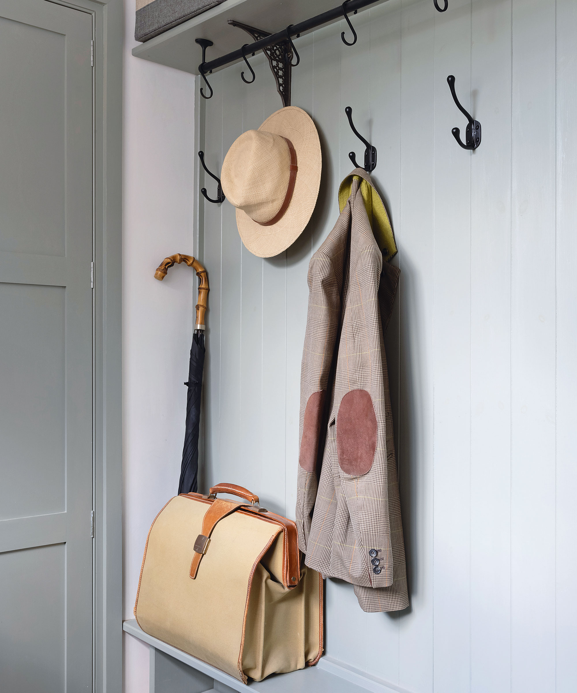 Coat rack and bench in utility room