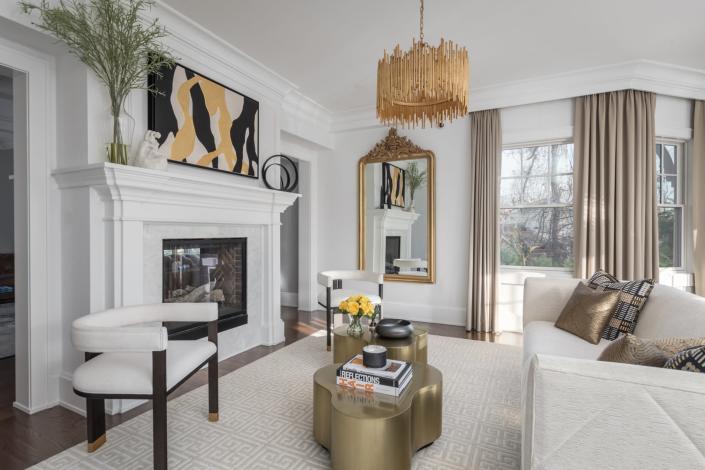 Adri + Dahlman Interiors refresh a living room with crisp white paint.